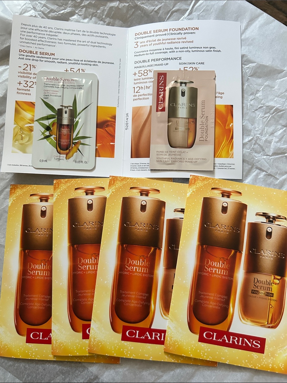Clarins Double Serum Sample Sachets — Gold and Amber Packaging